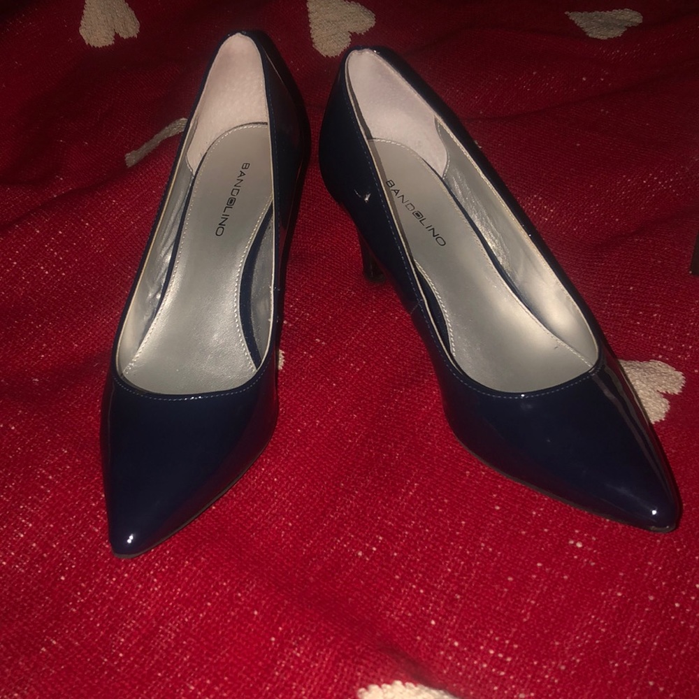Navy blue high heels. Size 9 medium. Wore twice.